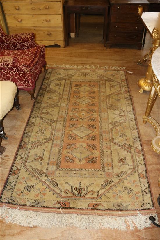 Orange & cream ground rug